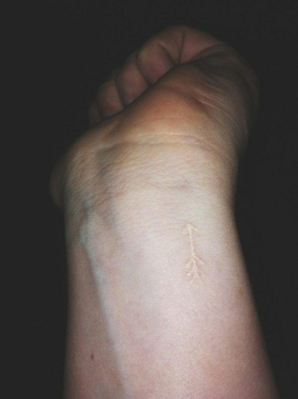 Small Arrow Tattoo