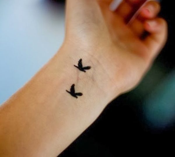 Small Birds Flies Tattoo On Wrist