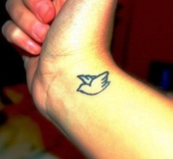 Small Dove Bird Tattoo