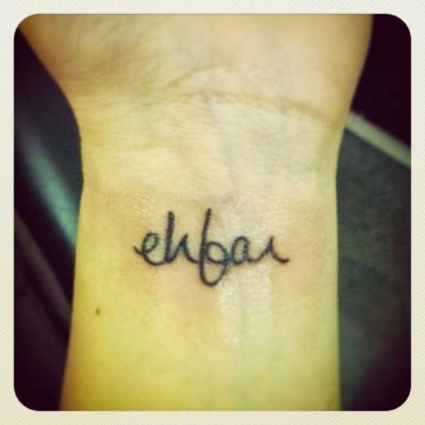 Small Letter Wrist Tattoo