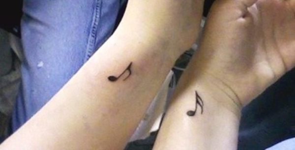 Small Music Note Tattoo On Wrist 