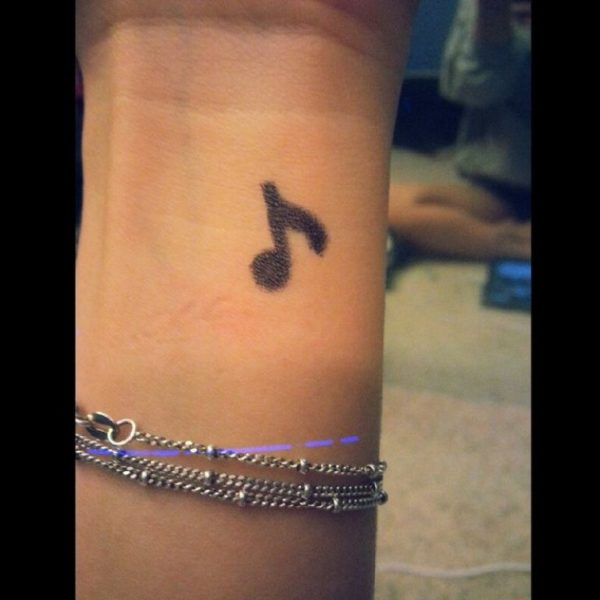 Small Music Note Tattoo