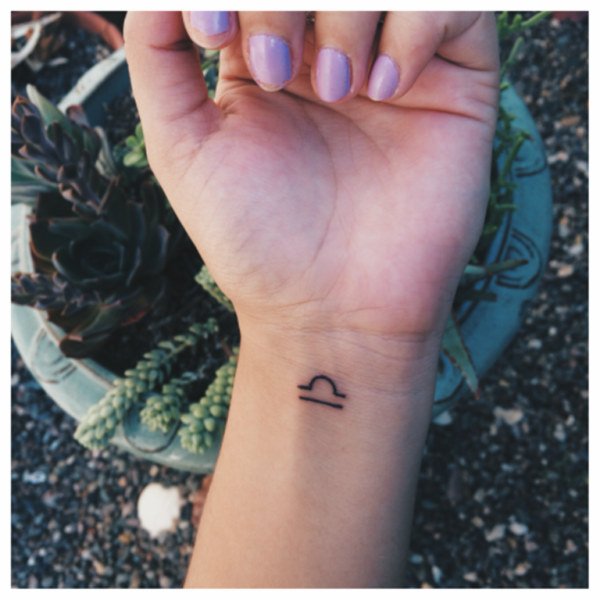 Small Symbol Tattoo