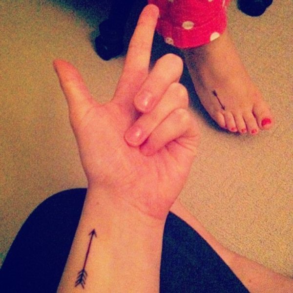 Small Thin Arrow Tattoo On Wrist