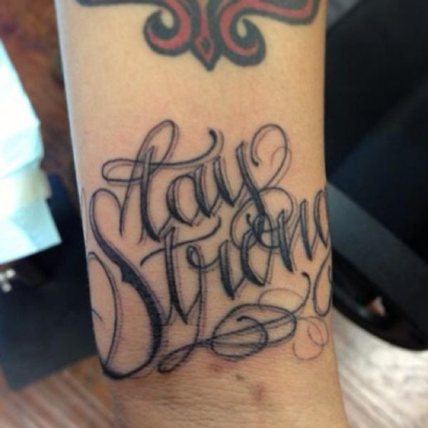 Stay Strong Script Tattoo On Arm