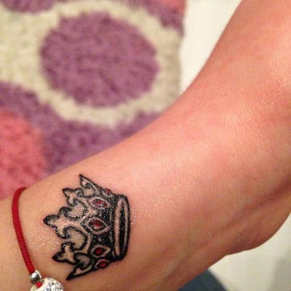 Stunning Crown Tattoo On Wrist