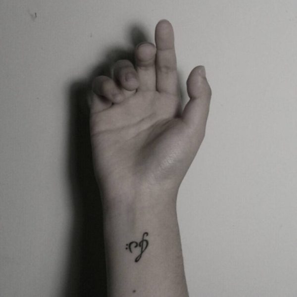 Stylish Musical Heart Tattoo