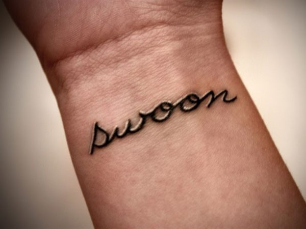 Swoon Word Tattoo On Wrist