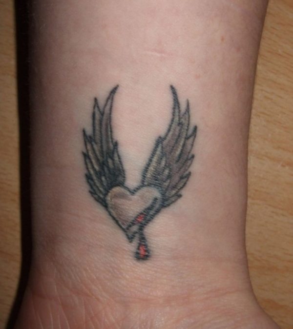 Tiny Angel Wings Tattoo