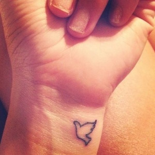 Tiny Dove Tattoo