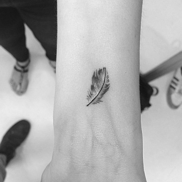 Tiny Feather Tattoo