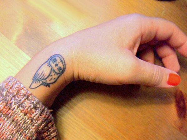 Tiny Owl Tattoo On Wrist