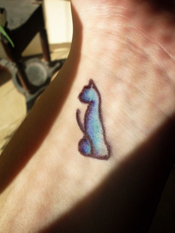 Tiny colored  Cat Tattoo On Wrist