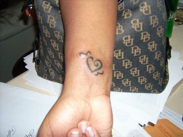 Tribal Heart Tattoo On Wrist