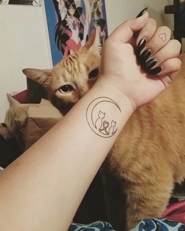 Unique  Cat Tattoo On Wrist