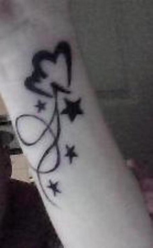 Unique Star Tattoo On Wrist