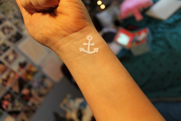 White Ink Anchor Tattoo