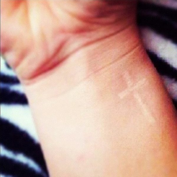 White Ink Cross Tattoo 