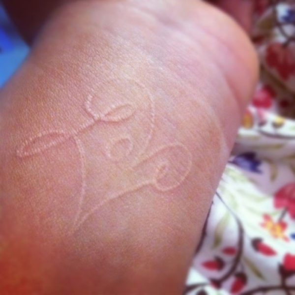 White Ink Love Tattoo