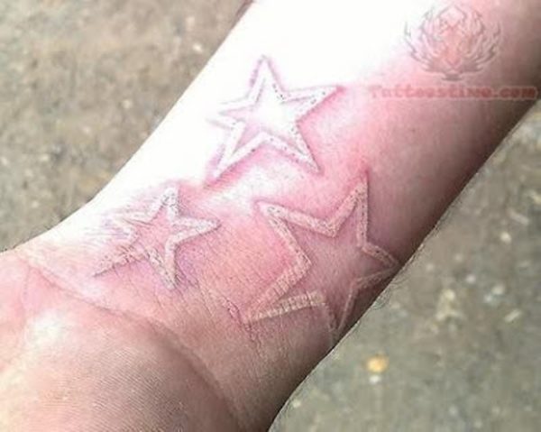 White Ink Star Tattoo