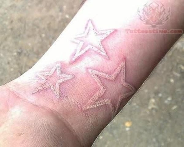 White Ink Star Tattoo