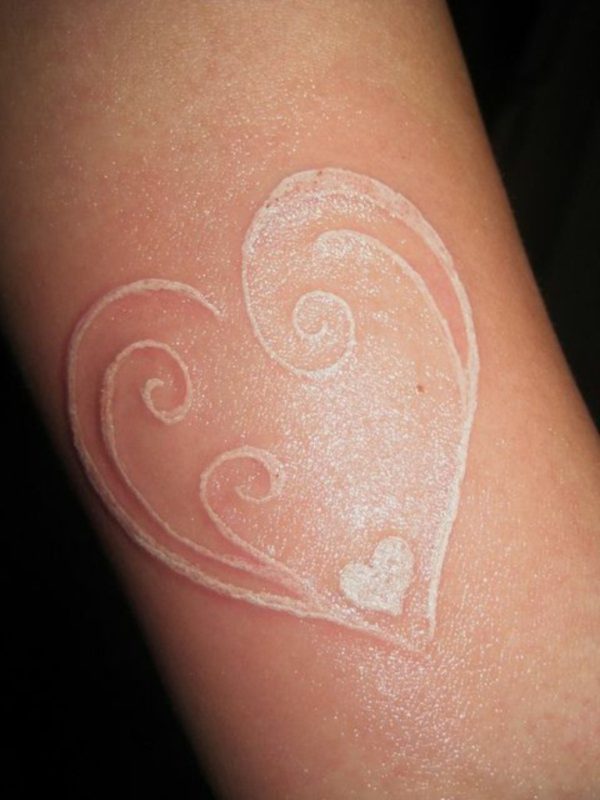 White Ink Heart Tattoo On Wrist