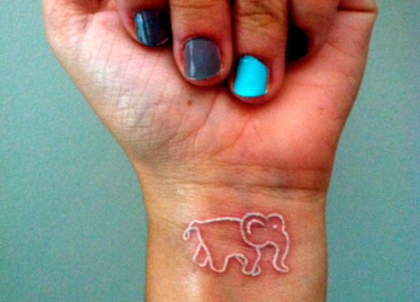 White Inked Elephant Tattoo