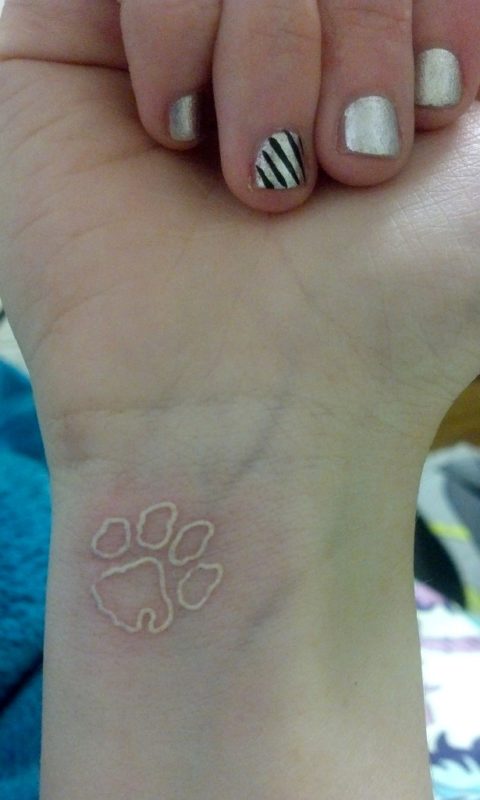 White Inked Paw Tattoo