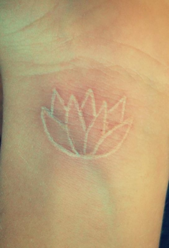 White Lotus Tattoo On Wrist