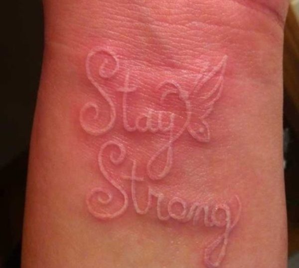 White Stay Strong wording Tattoo