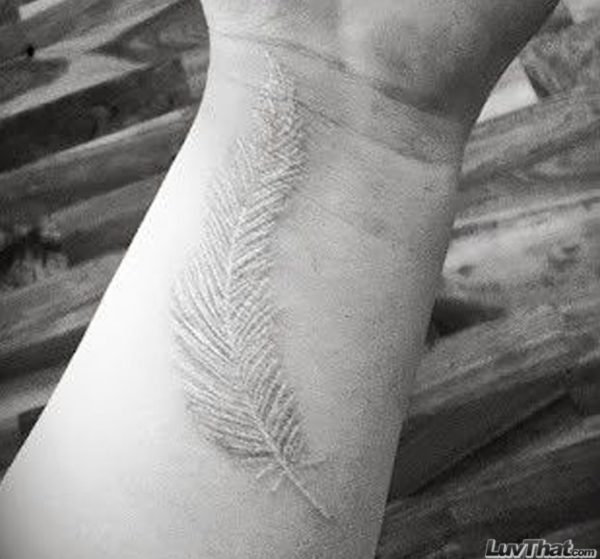 White Feather Tattoo On Wrist