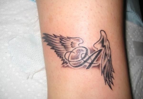 Word And Wings Tattoo