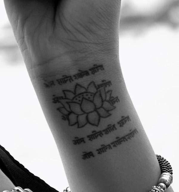 Wording And Lotus Tattoo