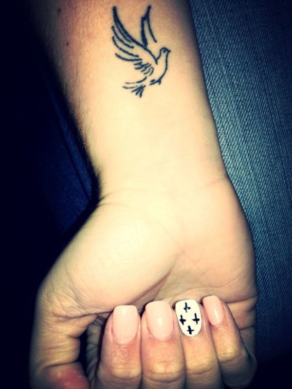 grey Dove Tattoo On Wrist