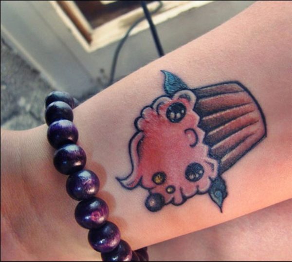 Adorable Cartoon Tattoo On Wrist