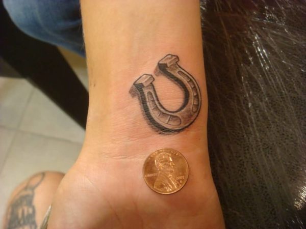 Adorable Horse Shoe Tattoo On Wrist-ht101