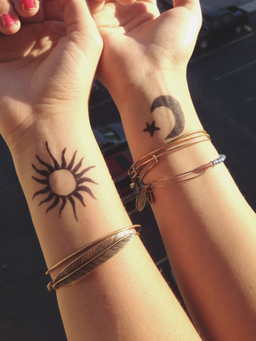 Adorable Sun Tattoo On Wrist