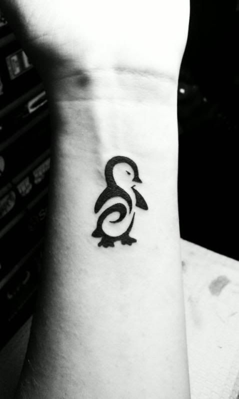 Amazing Penguin Wrist Tattoo
