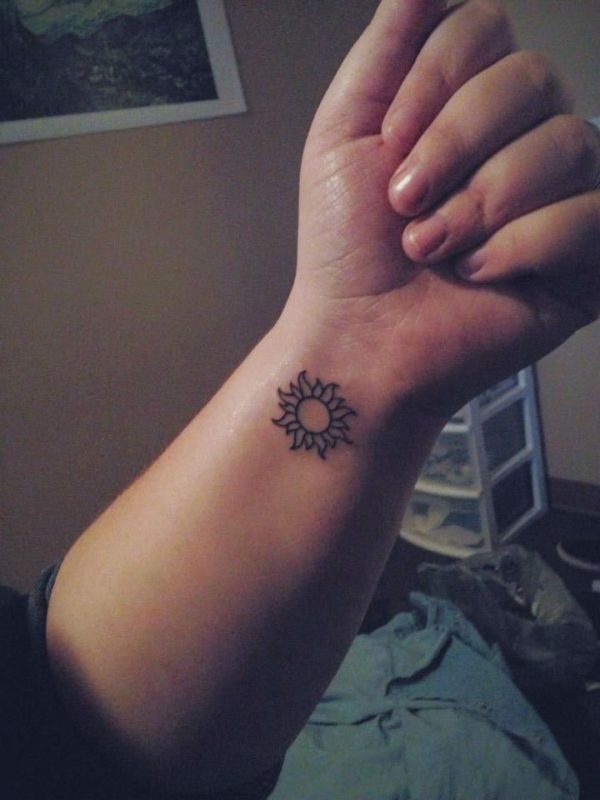 Amazing Sun Tattoo On Wrist