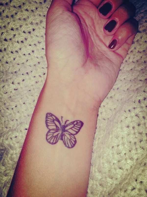 Amazing Tribal Butterfly Tattoo On Wrist
