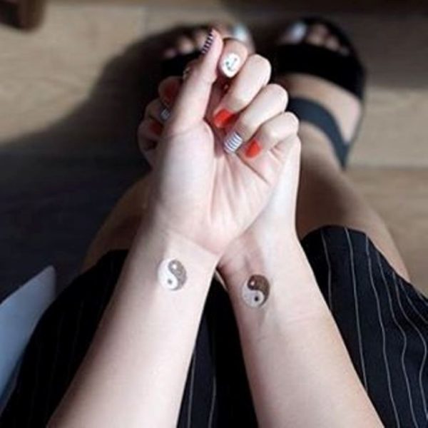 Amazing Yin Yang Tattoo On Wrist
