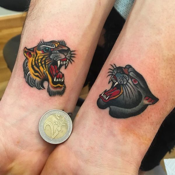 Angry Colorful Tigers Tattoo On Wrist