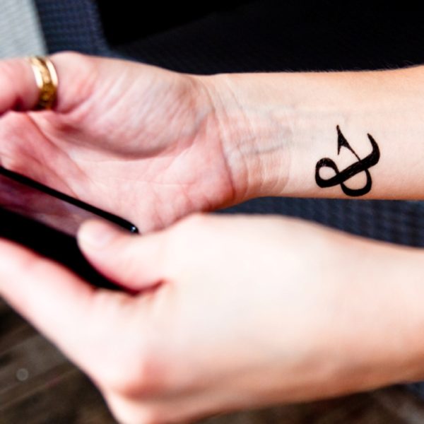 Attractive Ampersand Wrist Tattoo