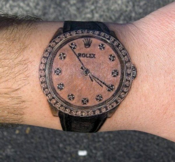 Attractive Clock Tattoo On Wrist