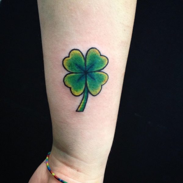 Attractive Four Leaf Tattoo On Wrist