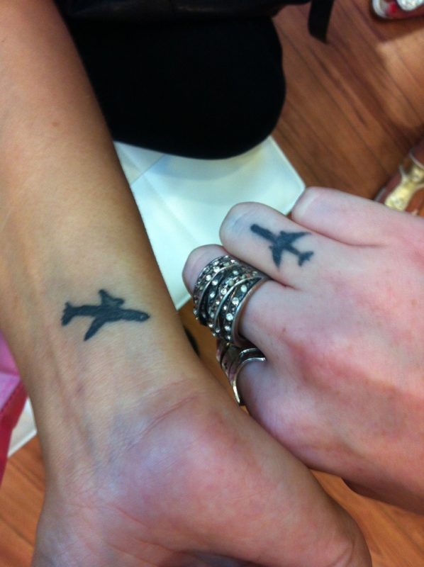 Attractive Plane Tattoo On Wrist