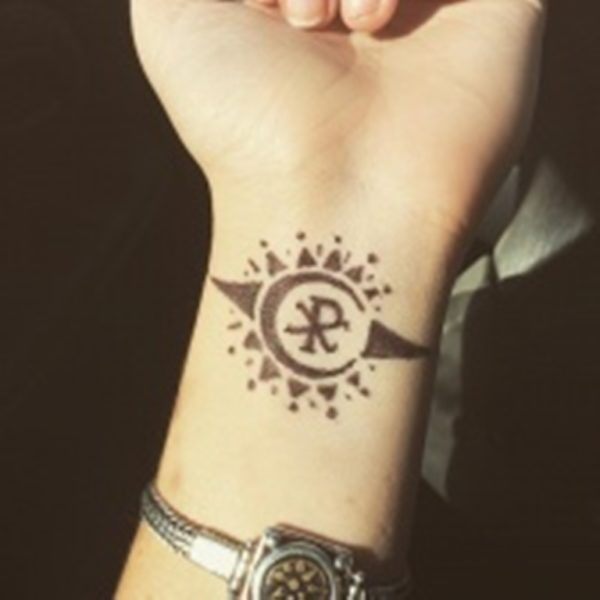 Attractive Sun Tattoo On Wrist