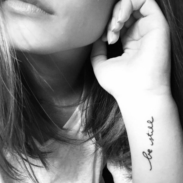 Be Still Tattoo On Girl Wrist