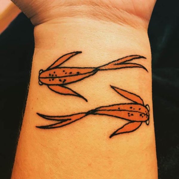 Beautiful Orange Fish Tattoo