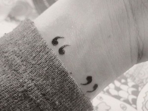 Beautiful Quotation Mark Tattoo On Wrist